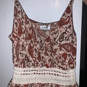 Justify brand. Size small. Paisley brown/orange and tan color